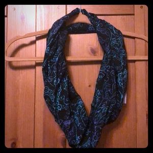 Black scarf with teal and purple floral pattern